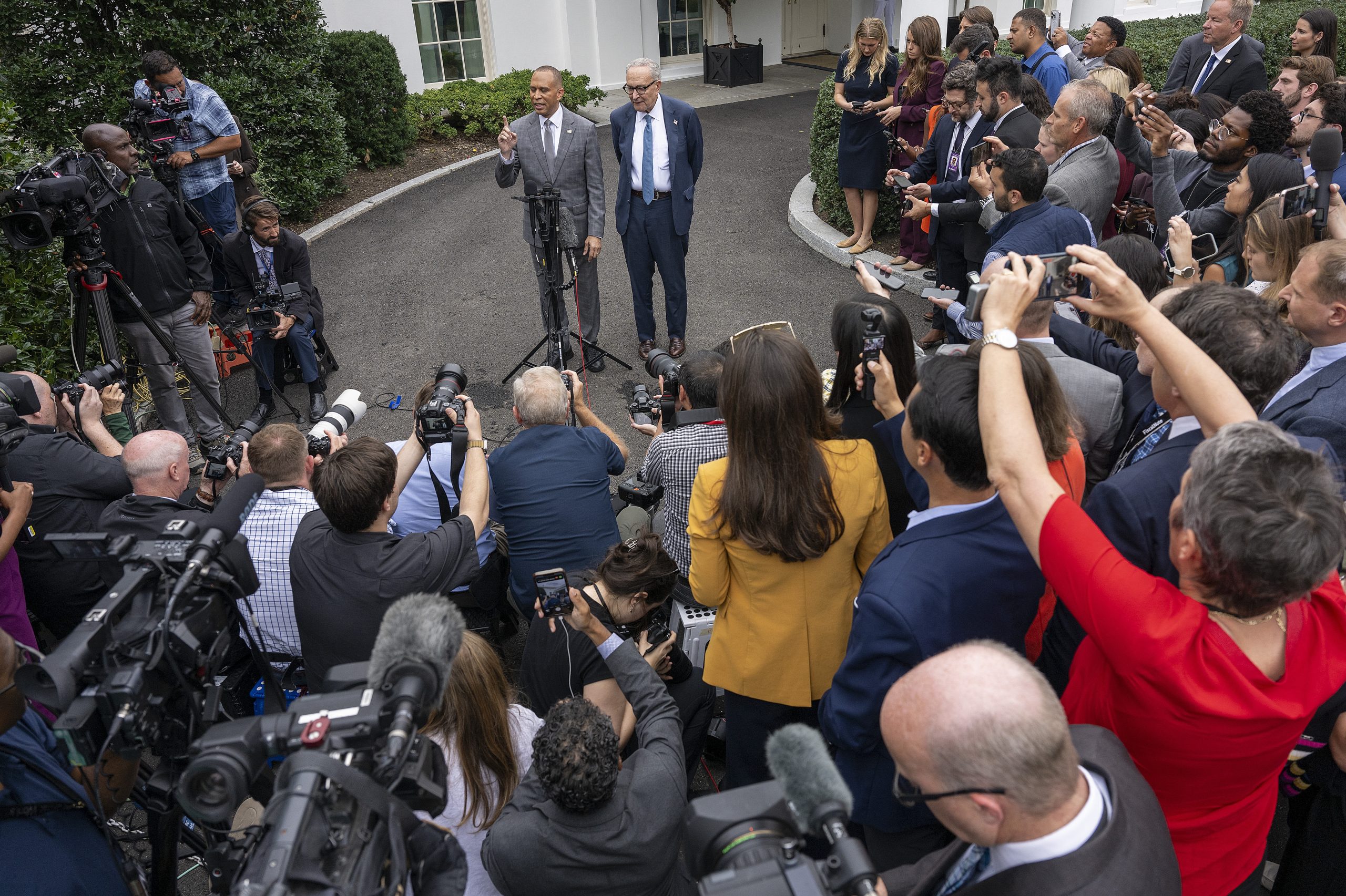 House Minority Leader Hakeem Jeffries and Senate Minority Leader Chuck Schumer, both from New York City, speak to reporters outside the White House Monday after meeting with Republican Leadership and US President Donald Trump. Trump has now frozen $18 billion in infrastructure funding for projects in New York.