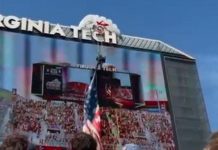 WATCH: Skydiver slams into Virginia Tech scoreboard, dangles by parachute