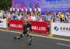 A humanoid robot sprints past the human half-marathon world record in Beijing race