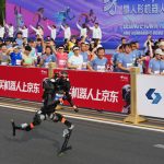 A humanoid robot sprints past the human half-marathon world record in Beijing race