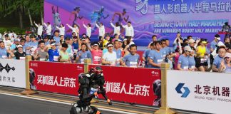 A humanoid robot sprints past the human half-marathon world record in Beijing race