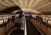 A work vehicle hits a stopped Washington Metro train, injuring 11