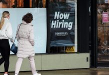 US jobless claim filings rise modestly to 214,000 last week, remain at healthy levels