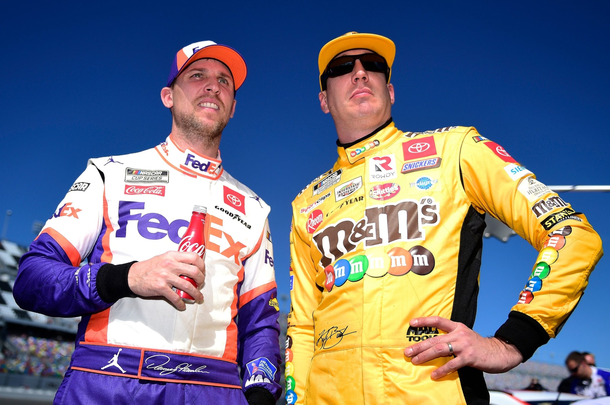 PHOTO: Kyle Busch and Denny Hamlin stand on the grid during qualifying for the NASCAR Cup Series 62nd Annual Daytona 500 at Daytona International Speedway, on Feb. 9, 2020, in Daytona Beach, Fla.