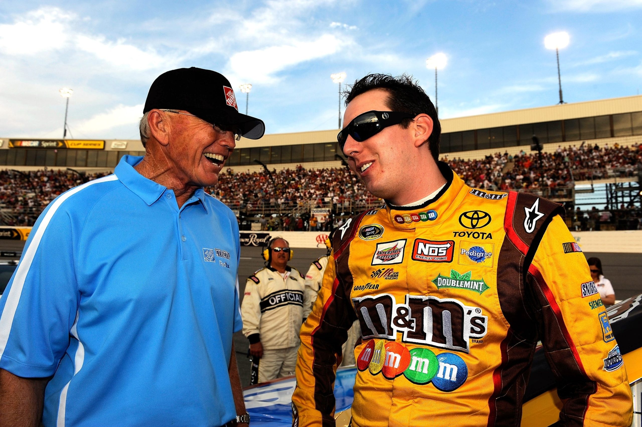 PHOTO: Kyle Busch talks with team owner Joe Gibbs (L) prior to the start of the NASCAR Sprint Cup Series Crown Royal Presents the Heath Calhoun 400 at Richmond International Raceway, on May 1, 2010, 2010, in Richmond, Virginia.