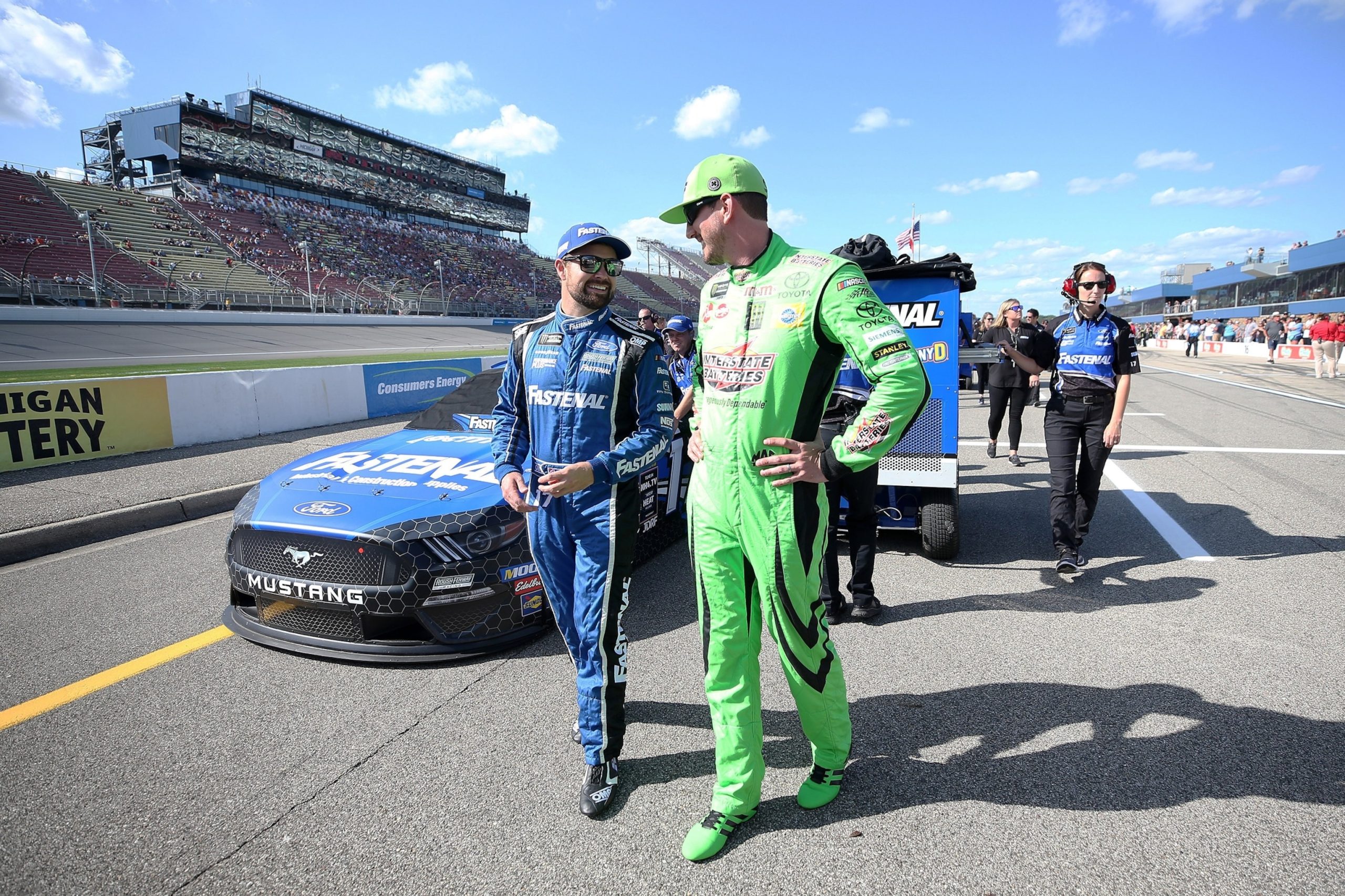 PHOTO: Ricky Stenhouse Jr., talks with Kyle Busch during qualifying for the Monster Energy NASCAR Cup Series Consumers Energy 400 at Michigan International Speedway, on Aug. 9, 2019, in Brooklyn, Michigan.