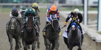 Napoleon Solo holds off Iron Honor to win the Preakness