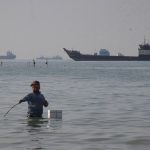 Trump says the US will ‘guide’ stranded ships from the Strait of Hormuz