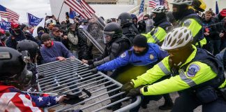 Officers who defended Capitol from rioters sue to block payouts from fund