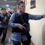 A Philippine senator wanted by the International Criminal Court flees from Senate