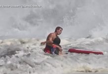WATCH: Lifeguard fights to rescue boy caught in high surf