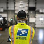A judge expands a block on U.S. Postal Service work on Trump’s mail-in voting order