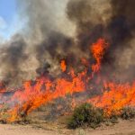 Crews battle wildfires in western U.S. and Canada