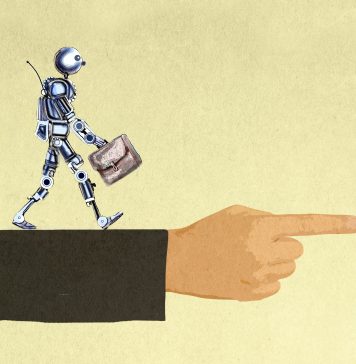 Many recent grads say AI is making it harder to get a job. Economists aren’t so sure