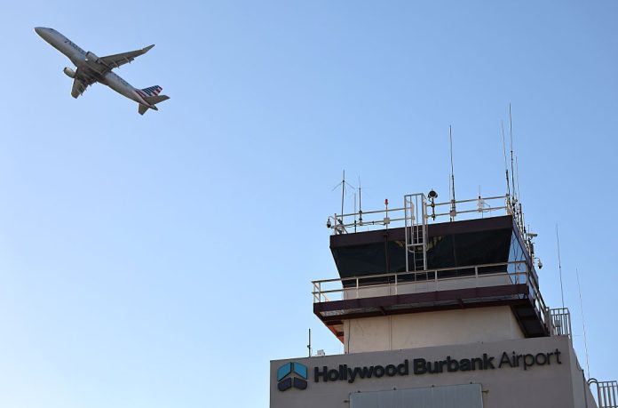 An American Eagle plane takes off from Hollywood Burbank Airport in October 2025 in Burbank, California.