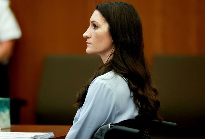 Lindsay Clancy listens to testimony during her murder trial at Plymouth Superior Court in Plymouth, Mass.