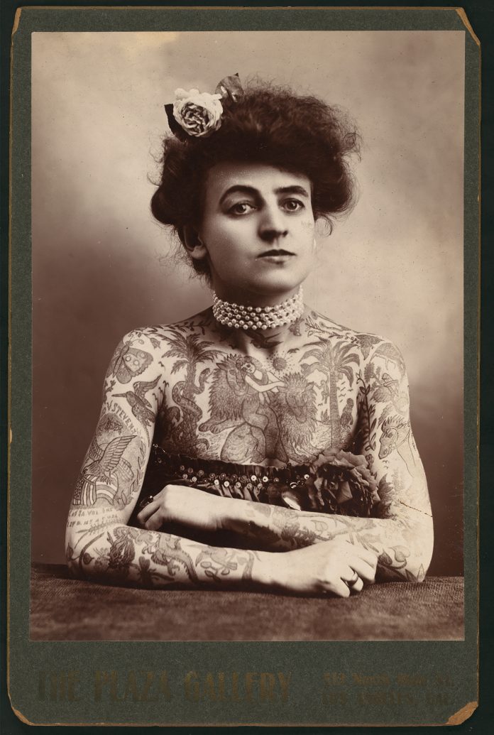 A 1907 photo made in Los Angeles, Calif., shows the constellation of tattoos on Maud Wagner