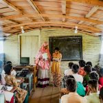 Whatever happened to the floating schools of Bangladesh? Hosne Ara teaches a group of fourth graders, seated on benches inside the floating school