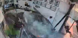 WATCH: Car slams into tattoo shop 260913 wn tattoo crash vo hpmain 16x9 1600