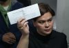 Philippines Vice President Sara Duterte posts bail after arrest Philippine Vice President Sara Duterte shows a document to reporters at the Quezon city justice hall Saturday, Sept. 5, 2026, after an arrest warrant was issued on charges that she publicly threatened to have the president and two other people assassinated.