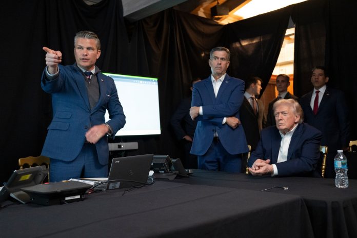 President Trump monitors U.S. military operations in Venezuela with Defense Secretary Pete Hegseth (left) and CIA Director John Ratcliffe (center) at Mar-a-Lago in Palm Beach, Fla., on Jan. 3. U.S. forces captured Venezuela