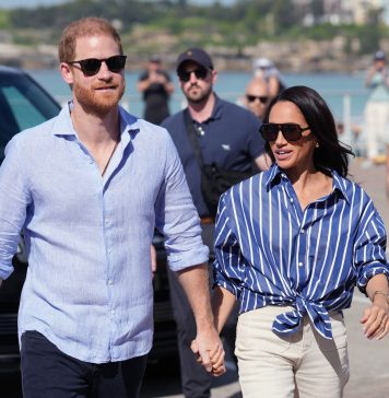King Charles III clarifies status of Prince Harry and his wife, Meghan FILE - Prince Harry, and Meghan, the Duke and Duchess of Sussex, arrive for an event, during a visit to Bondi Beach, Australia, April 17, 2026.