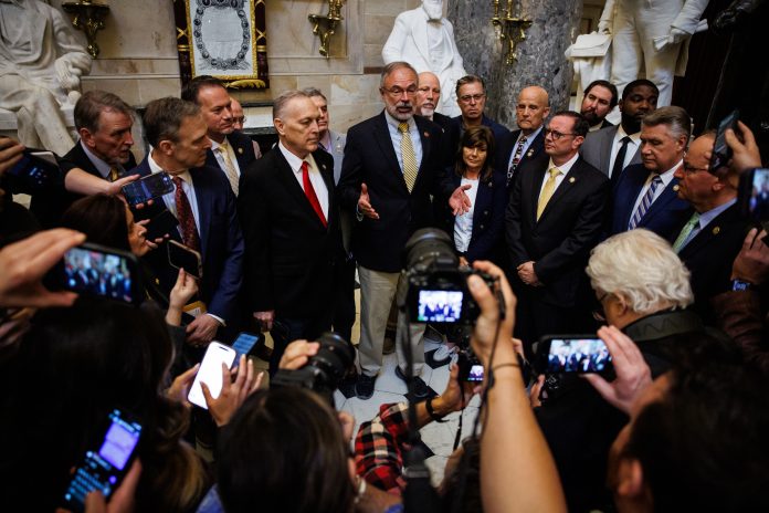 House Freedom Caucus chair, Rep. Andy Harris, R-MD, spoke to reporters alongside other members of the Freedom Caucus in March amid tense negotiations over government funding.
