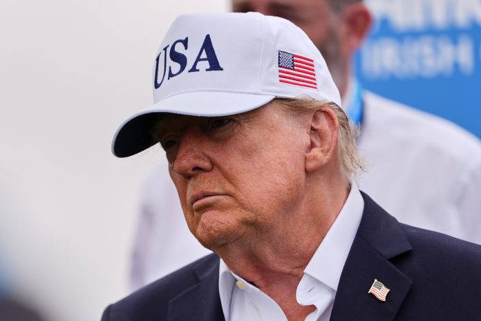 U.S. President Donald Trump attends the Irish Open golf tournament at Trump International Golf Links in Doonbeg, Ireland, Sunday, Sept. 13, 2026.