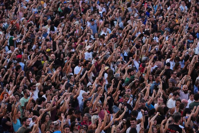 People gather during a protest following the eviction last Wednesday of 87-year-old Maricarmen to demand stronger laws to protect renters at Puerta del Sol in Madrid, Spain, Saturday, Sept. 26, 2026.