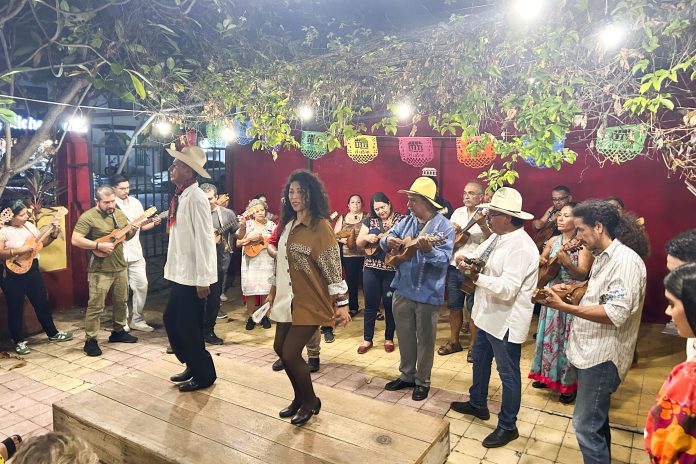 Jarana players join a mass jam session at a Veracruz fandango while the dancers pound out rhythms with their heels on the wooden tarima. 