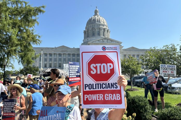 People opposed to a congressional redistricting plan rally outside the Missouri Capitol in Jefferson City, Mo., earlier this month.