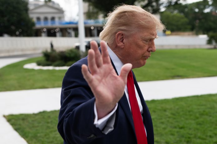 President Trump waves to the media on the South Lawn of the White House on September 26, 2026 in Washington, D.C. Trump is traveling to Knoxville, Tennessee to attend the University of Tennessee vs. University of Texas College football game.