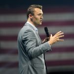 A year after Charlie Kirk was killed, young conservatives navigate a divided movement Charlie Kirk speaks at Turning Point