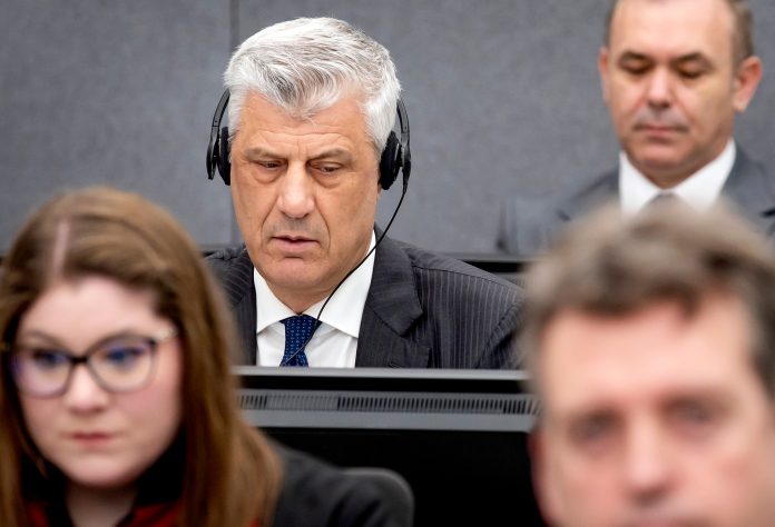 FILE - Former Kosovo president Hashim Thaci, top left, appears before the Kosovo Tribunal as he defends himself against charges including murder, torture and persecution allegedly committed during his country