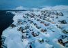 US and Denmark reach deal to build US military presence in Greenland Houses covered in snow are seen on the coast of a sea inlet of Nuuk, Greenland, March 7, 2025.