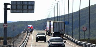 Russia and North Korea open the first road across their shared border In this photo released by the Government of Primorsky Krai Region on Monday, Sept. 7, 2026, vehicles drive across the new bridge between Russia and North Korea named after the Soviet officer Yakov Novichenko, who is credited with saving North Korea