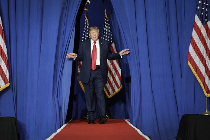President Trump arrives for a campaign rally with Sen. Darline Graham (R-SC) on August 21 in Myrtle Beach, South Carolina.