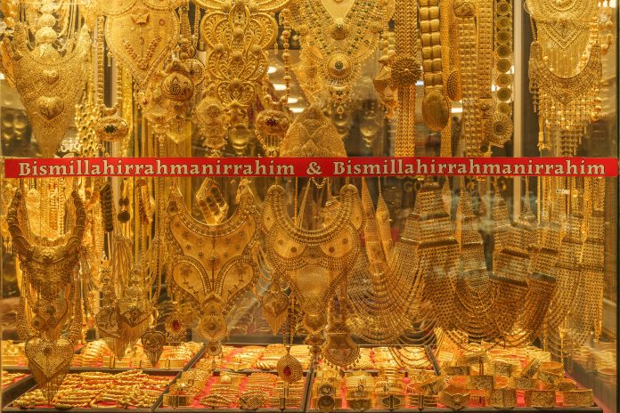 Jewelry displays gold at the Grand Bazaar in Istanbul, Turkey, on Aug. 26, 2026. Finance Minister Mehmet Şimşek has said that about $640 billion in gold and foreign currency is held outside the financial system. For many Turkish savers, physical gold is still a safe way to protect their money from inflation and economic uncertainty. This practice is known as "yastık altı altın," or "gold under the mattress," referring to the tradition of keeping wealth in physical assets rather than in banks.
