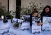 The driver who slammed into an LA bus before helicopter crash is charged with murder Savannah Sampson, right, and Nicole Lewis, help set up a vigil for the victims of Tuesday
