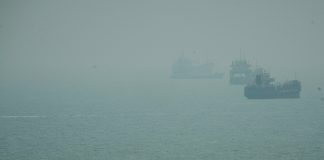 U.S. military says it destroyed 5 Iranian oil tankers after attacks on Navy warship A motorboat travels past commercial vessels anchored amid haze in the Strait of Hormuz off Bandar Abbas, Iran, Monday, Sept. 7, 2026.
