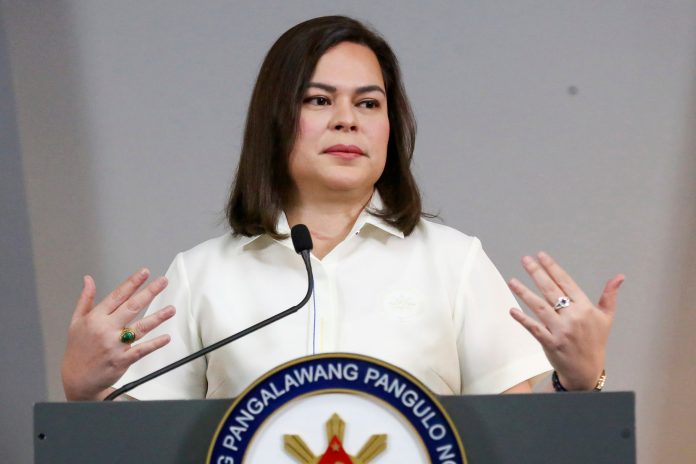 FILE -Philippine Vice President Sara Duterte gestures as she speaks during a press conference in Manila, Philippines on Friday, Feb. 7, 2025.