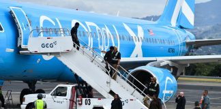 U.S. Supreme Court sides with Trump administration in third-country deportations Migrants deported from the U.S. get off an airliner at the runway of the Juan SantamarĆa International Airport in Alajuela, Costa Rica, in April 2026.