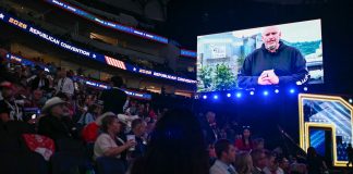 Fetterman, already at odds with his party, makes surprise video for GOP convention Sen. John Fetterman, D-Pa., is displayed on a screen as he delivers a video message during the Republican National Midterm Convention at the American Airlines Center in Dallas on Wednesday.