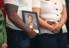 Questions remain after grand jury declines indictment in Nolan Wells’ death Christine Wonsley and Elmore Wonsley, mother and stepfather of Nolan Wells, stand on a stage with a photo of their son as they appear at the National Urban League