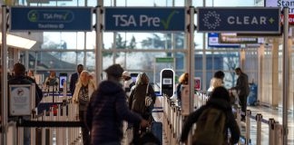 TSA brings back gate access for some people without plane tickets 25 years after 9/11 FILE - Travelers walk through a TSA security checkpoint at Reagan National Airport in Washington, March 24, 2026.