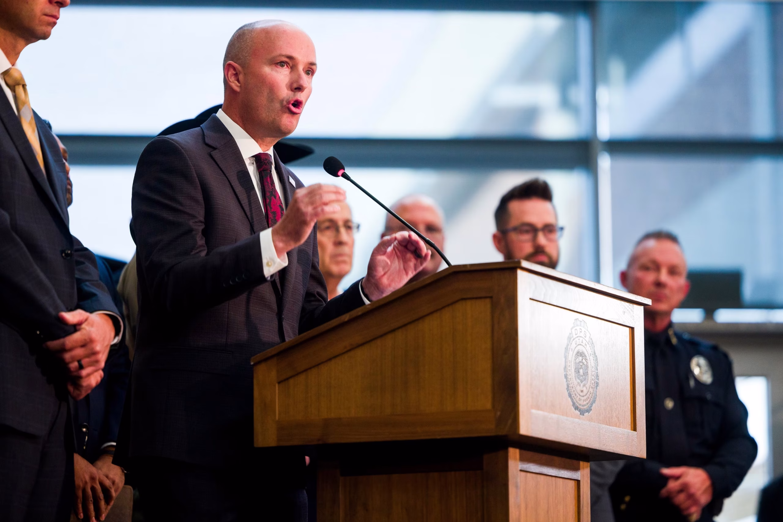 PHOTO: Utah Gov. Spencer Cox speaks at a press conference flanked by FBI director Kash Patel following the fatal shooting of political activist Charlie Kirk during an event at Utah Valley University on September 12, 2025 in Orem, Utah.